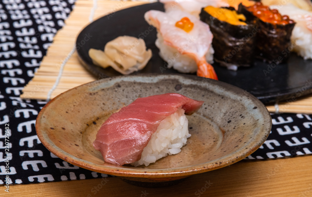 medium fatty tuna sushi in a plate close-up medium fatty tuna sushi in a plate close-up