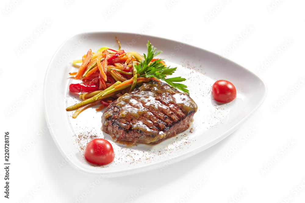 Grilled Beef Steak with Vegetables Isolated on White Background Grilled Beef Steak with Vegetables Isolated on White Background