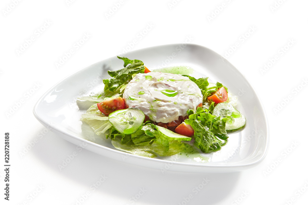 Hummus, Humus or Hommos with Salad Isolated on White Background Hummus, Humus or Hommos with Salad Isolated on White Background