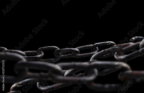 Rusty chain isolated on black background. photo