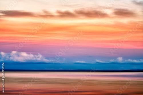 Clouds over the horizon of lake superior at sunset © Like