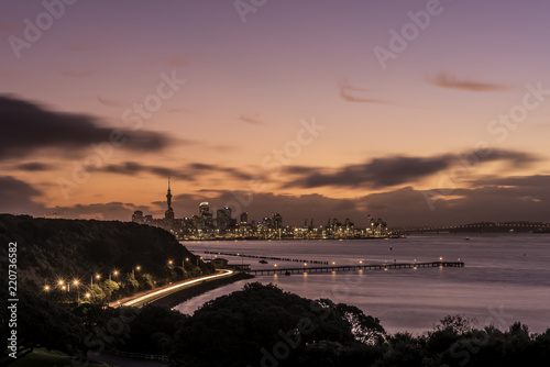 Auckland City skyline shortly after sunset from Bastion Point with Orakei Wharf in the middle ground.