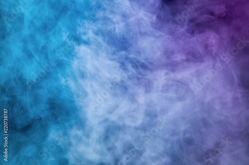 Colorful smoke on black background