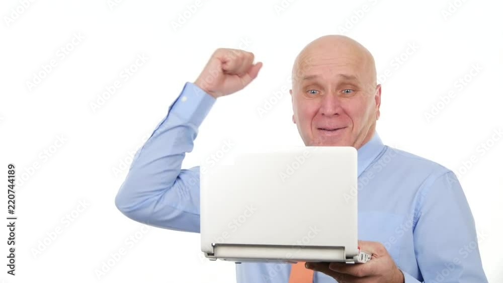 Businessman Read Online Good News on Laptop and Make Enthusiastic Hand Gestures Businessman Read Online Good News on Laptop and Make Enthusiastic Hand Gestures