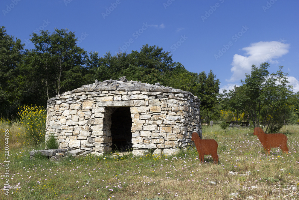 reconstruction of ancient sheepfold and fake sheep in Morcone