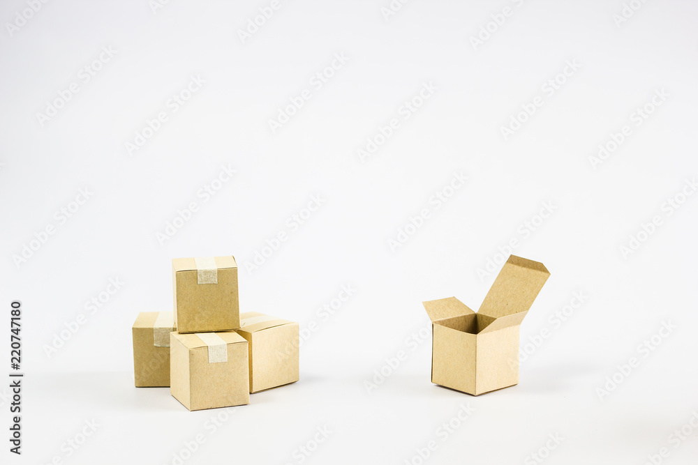 Shipment and delivery concept : 3 Closed and one open paper carton box on white background and space. Conceptual Think difference Close and open cardboard boxes.