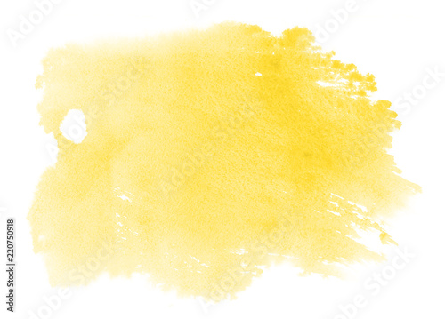 Abstract vibrant yellow watercolor on white background.The color splashing on the paper.