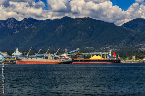 Carrier ship loaded with yellow sulfur at the port of Vancouver Canada © SvetlanaSF