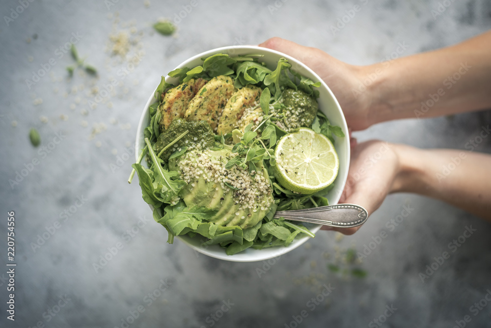 Obraz premium Green Fitness Breakfast Veggie Bowl with Falafel and Avocado