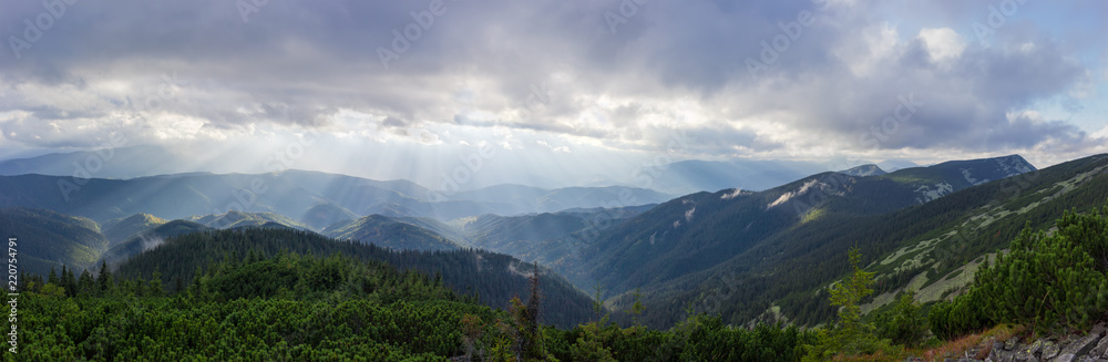 Mountain ridges overgrown with forest in Carpathian Mountains Mountain ridges overgrown with forest in Carpathian Mountains
