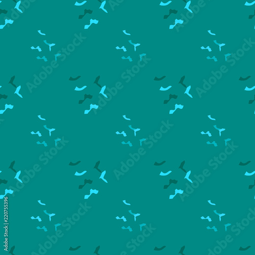 Seamless background pattern with various colored spots.