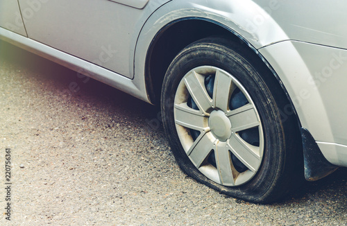 flat tire of a car © fedorovekb