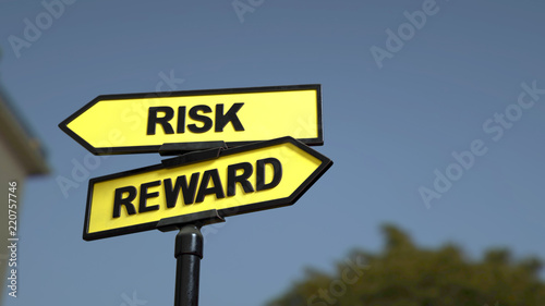 A road sign with risk reward words . 3d image. © Jane