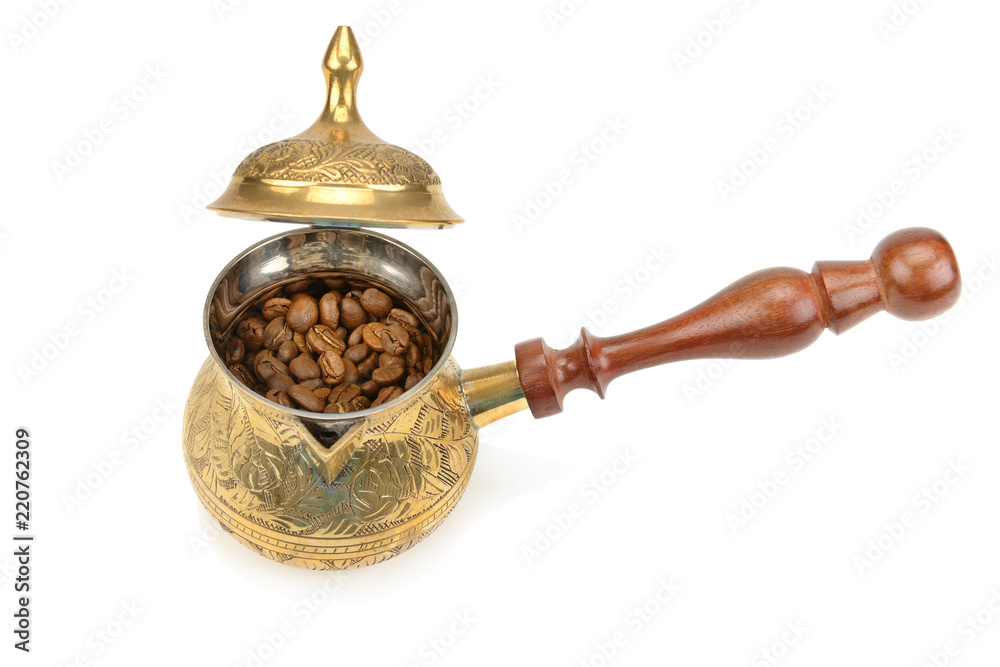 Coffeepot and coffee beans isolated on white background. Coffeepot and coffee beans isolated on white background.
