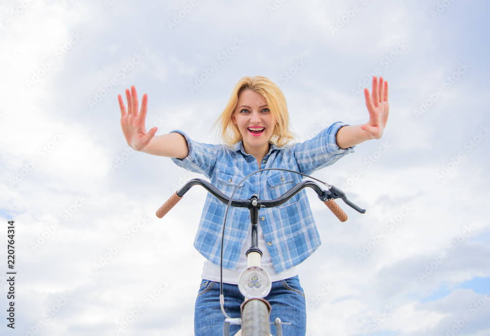 Check it out. Bicycle tricks. Girl can ride her bike with no handlebars. Woman likes to ride bike. Can everyday bicycling make you happier. Bicycling her hobby and best way to relax and reduce stress Check it out. Bicycle tricks. Girl can ride her bike with no handlebars. Woman likes to ride bike. Can everyday bicycling make you happier. Bicycling her hobby and best way to relax and reduce stress