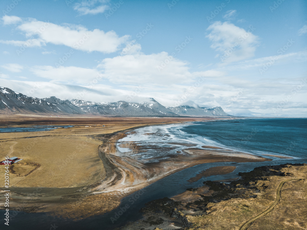 aerial view of beautiful coastline and sea with mountains on background, snaefellsnes, iceland