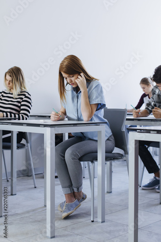 Schoolgirl Doing an Exam
