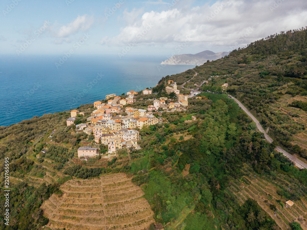 aerial view of beautiful village on hill near sea in arezzo province, Italy