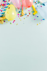 Flat lay decoration party pastel blue copy space top view