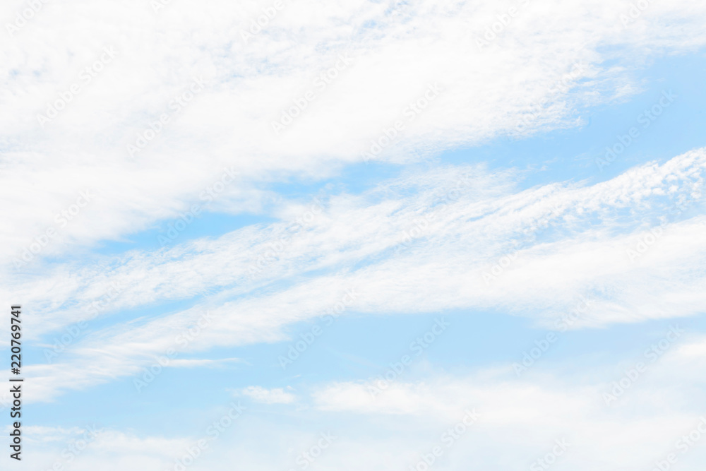 White clouds on a light blue sky. Background and texture for text White clouds on a light blue sky. Background and texture for text