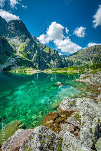 Fototapeta Naklejka Na Ścianę i Meble -  Black lake under Rysy peak, Tatra Mountains, Poland