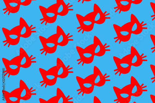 red paper cat mask pattern on blue background. Halloween conceptwhite paper cat mask pattern on blue background. Halloween concept photo