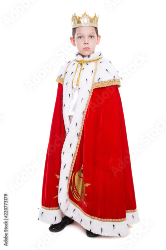Little boy wearing costume of a king