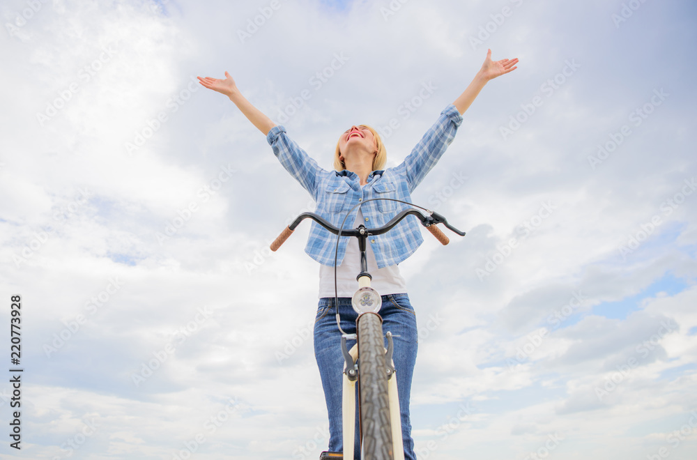 Girl relaxed and free sit on bike. Bicycling hobby and best way to relax and reduce stress. Everyday bicycling make you happier. Top mental benefits of cycling. Woman enjoy freedom while riding Girl relaxed and free sit on bike. Bicycling hobby and best way to relax and reduce stress. Everyday bicycling make you happier. Top mental benefits of cycling. Woman enjoy freedom while riding