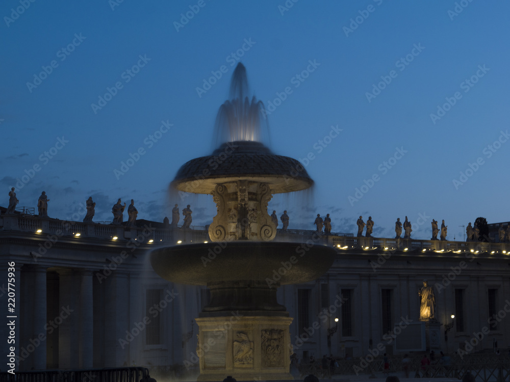 Cathedral of St Peters in the evening . fountain in the Plaza of St.Peter's, Vaticano, Italy, Rome 