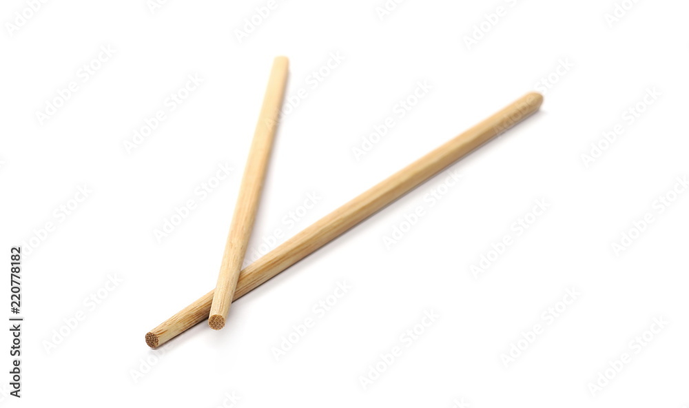 Asian wooden chopsticks isolated on white background Asian wooden chopsticks isolated on white background