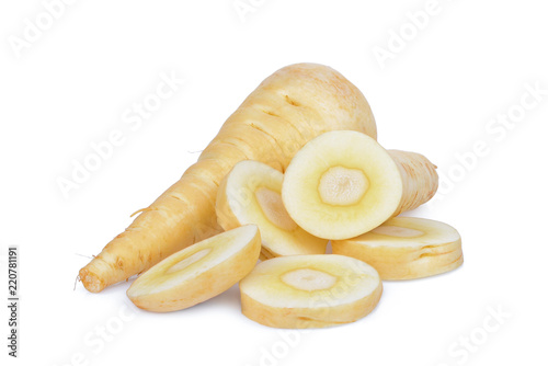 parsnip root with slices vegetable isolated on white background © boonchuay1970