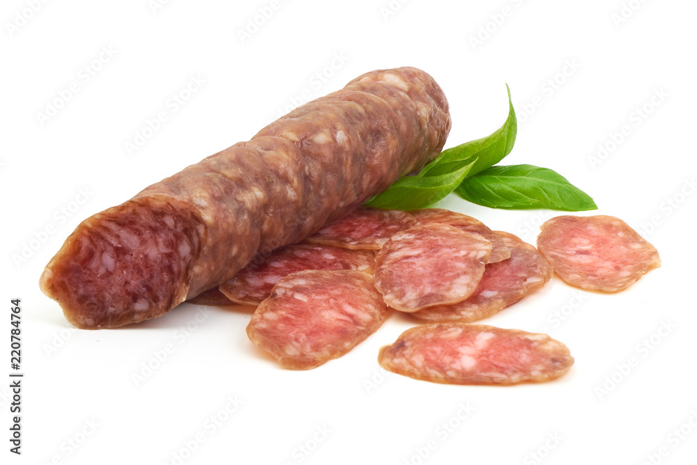 Smoked sausage with slices and green basil leaves, isolated on white background