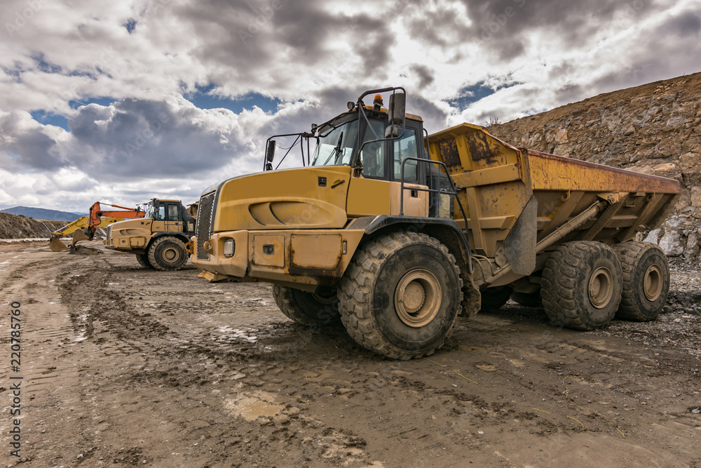 Truck on a building site with mud and water