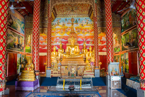 Golden Buddha statues , Wat Puak pia , Temple in Chiang Mai Thailand © Fotoglee
