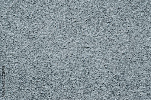 Gray cement wall texture, uneven surface with pattern, abstract background 