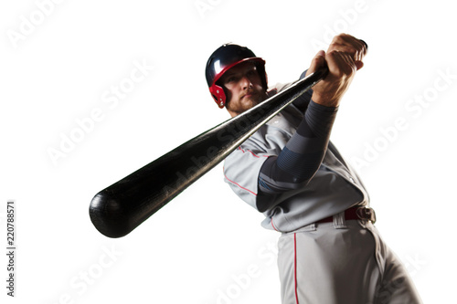 Isolated Baseball player bat the ball on white background photo