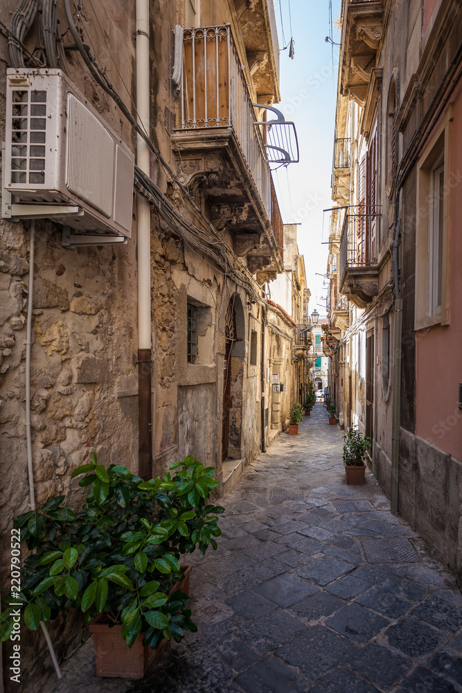 View of narrow street in Syracuse, Italy, Sicily island