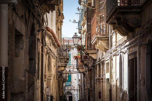 View of narrow street in Syracuse, Italy, Sicily island