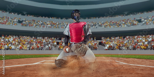 Gracz baseballa rzuca piłkę na profesjonalnym stadionie baseballowym