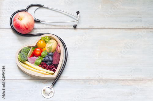 Healthy food in heart diet concept with stethoscope
 photo