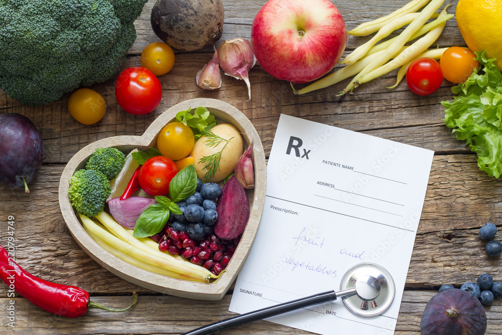 Healthy food in heart stethoscope and medical prescription diet and medicine concept
 - obrazy, fototapety, plakaty 