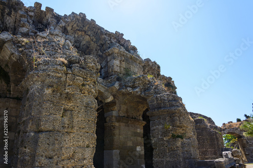 Fototapeta Naklejka Na Ścianę i Meble -  ruins of the ancient amphitheater with arched spans. Side, Turkey