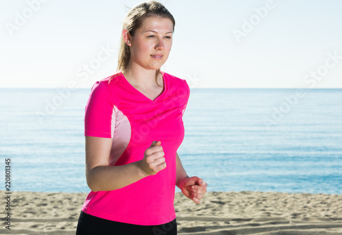 Girl running on seashore