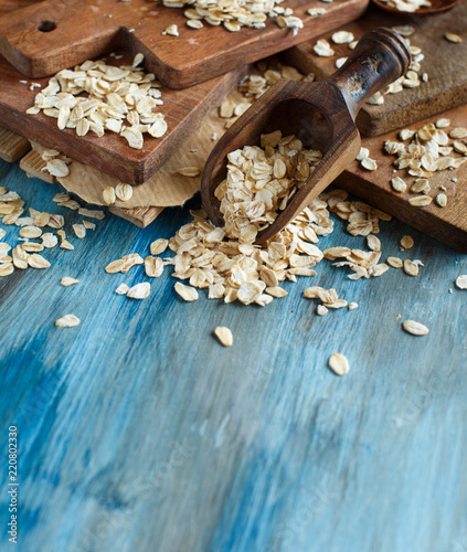 Rolled oats with a wooden spoon