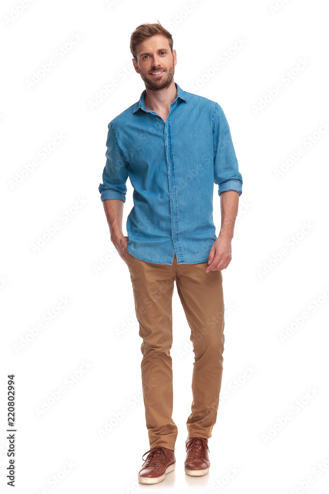Foto Stock full body picture of casual man posing | Adobe Stock