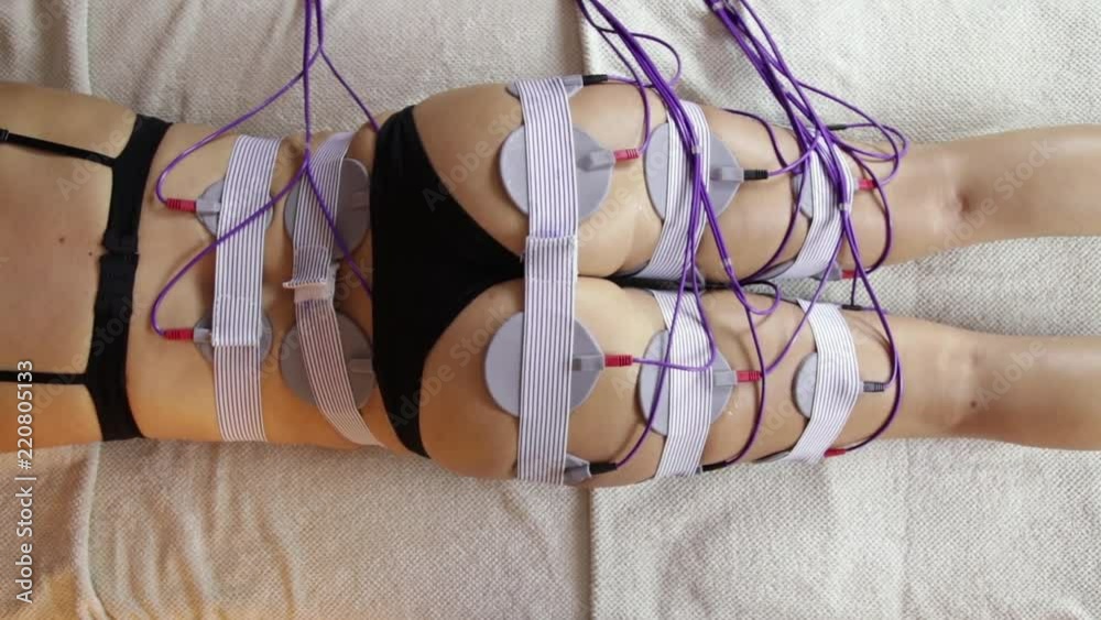 Close up of woman getting electro stimulation therapy of the butt. Hardware cosmetology and antiage therapy
