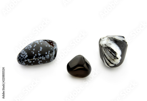Three different obsidians on white background