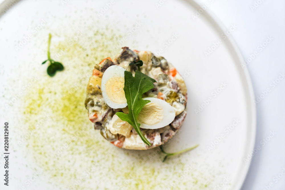 Russian salad with egg