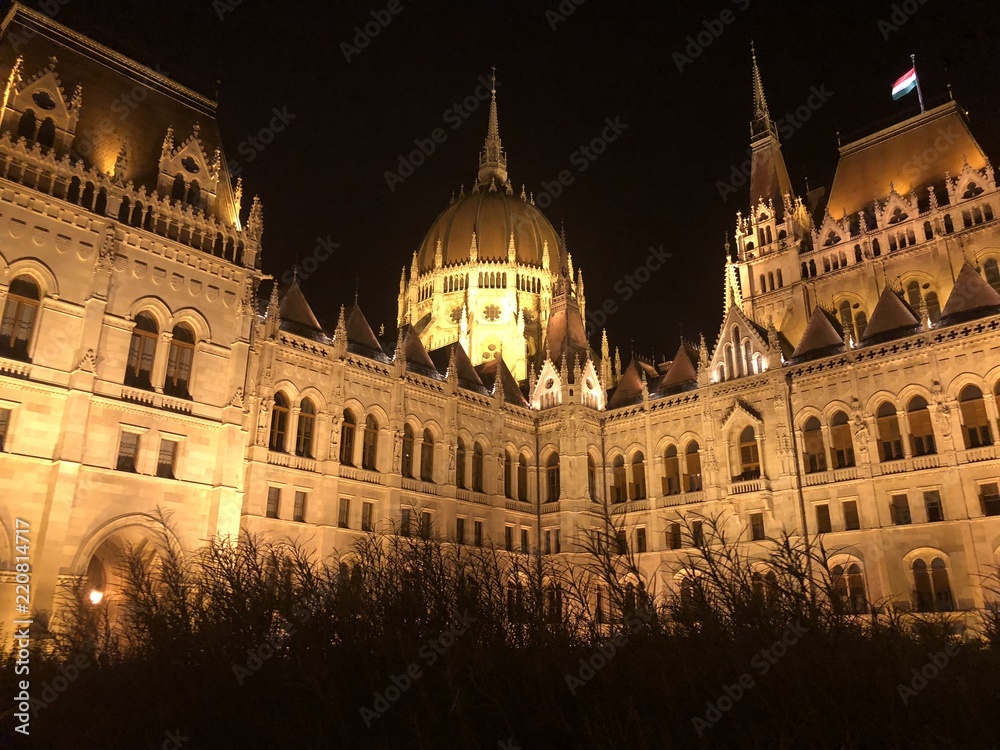 The Parliament building in Budapest, Hungary illuminated at night.