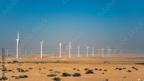 Electric wind turbine generators in the desert in Egypt.